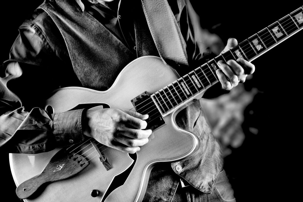 Black and white photo guitar player